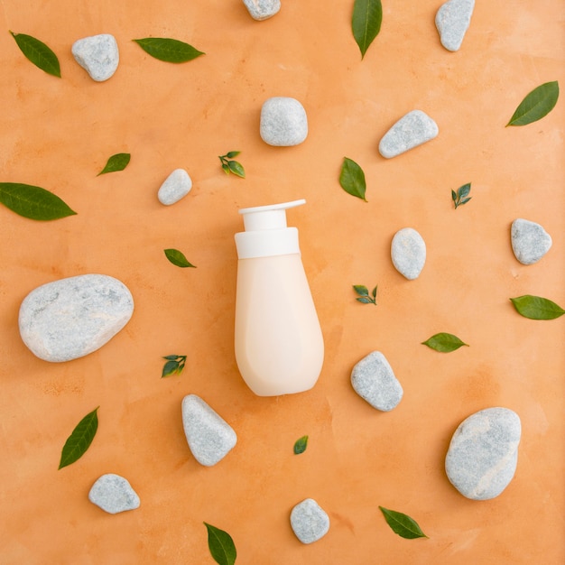 Bottle with lotion on table