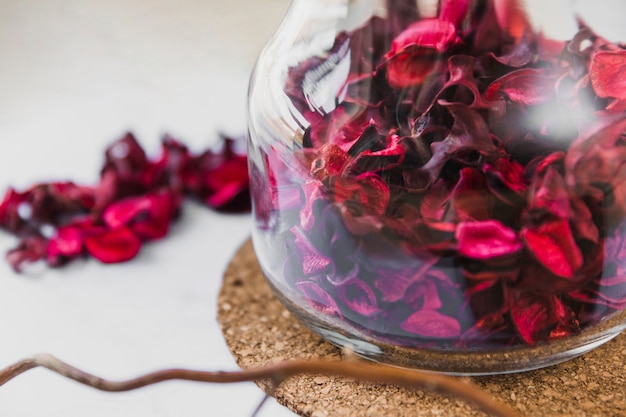 Free photo bottle with petals