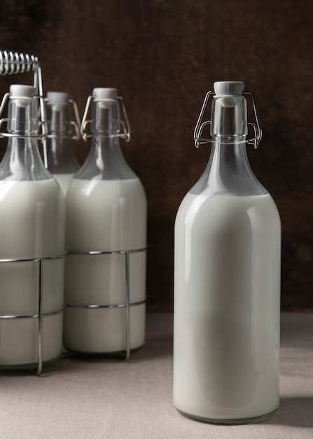 Free photo bottles of milk arrangement still life