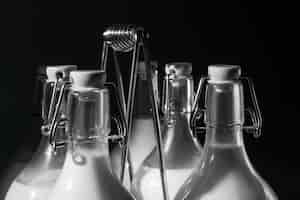 Free photo bottles of milk arrangement still life