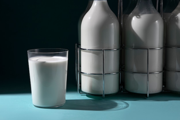 Free photo bottles of milk arrangement still life