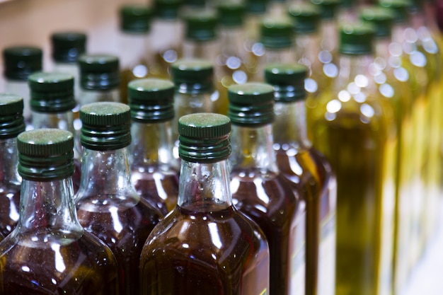 Free photo bottles of olive oil