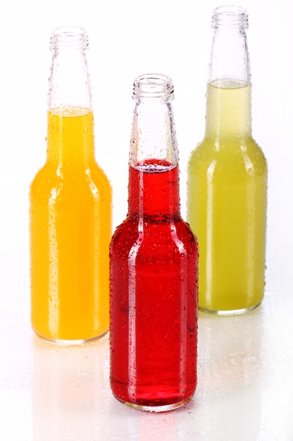 Bottles with colorful cocktail