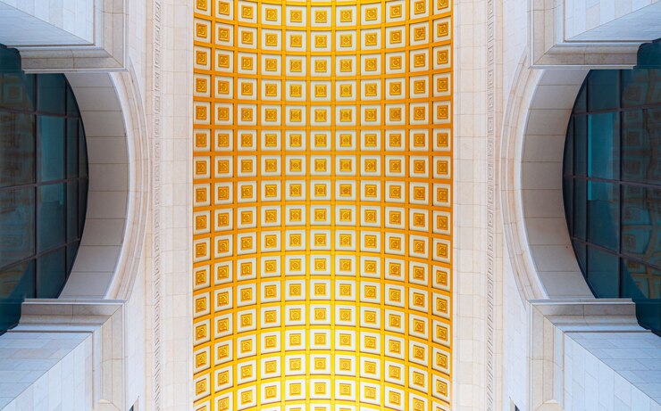 Free Photo bottom shot of the ceiling of a building in gold and white colors in phnom phen, cambodia