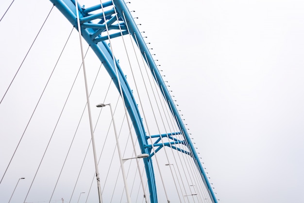 Bottom view of bridge on a foggy day