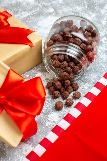 Bottom view cereal in jar xmas gifts on grey background