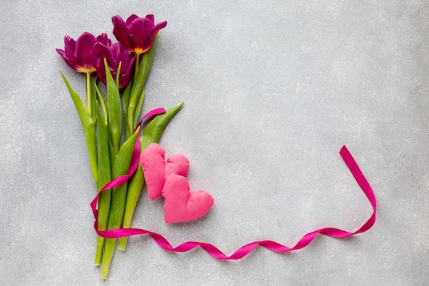 Bouquet of flowers and pink hearts