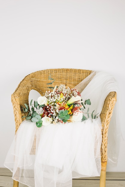 Bouquet of flowers with bridal veil