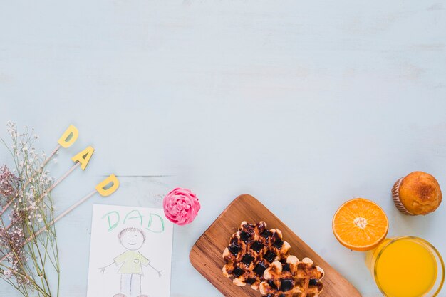 Bouquet and food near picture