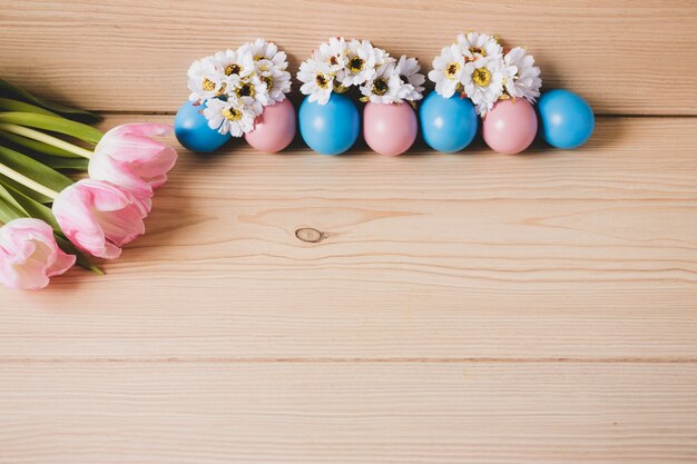 Bouquet near eggs and flowers composition