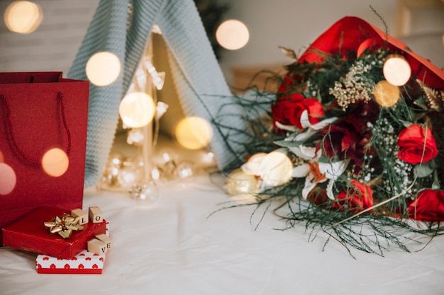 Bouquet and presents near blanket tent