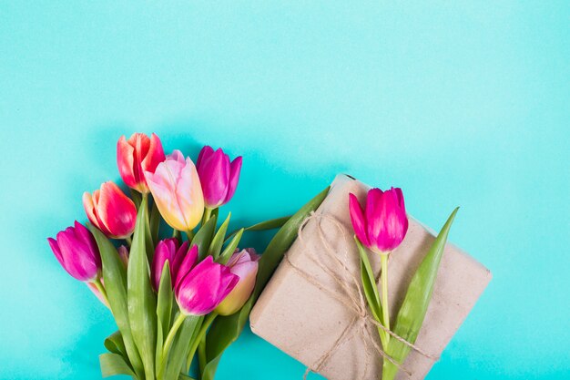 Bouquet of tulips and present box