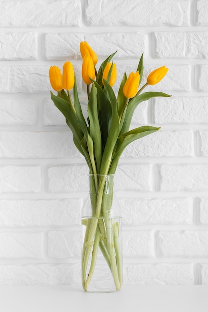 Bouquet of tulips in transparent vase
