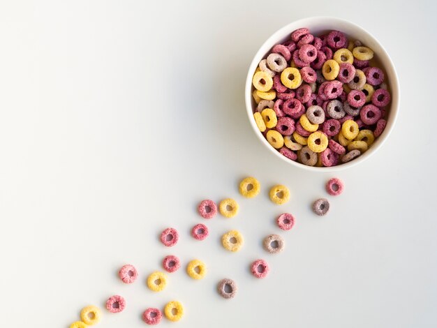 Bowl of colorful cereals top view