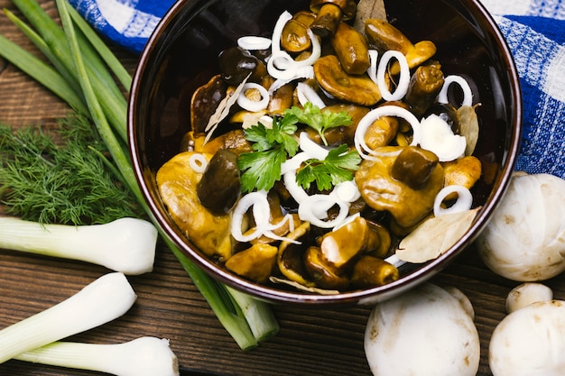 Bowl of cooked mushrooms and onions