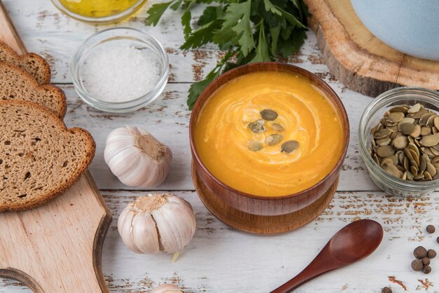 Bowl of cream soup and garlic