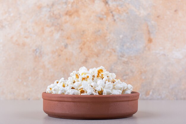 Bowl Of Salted Popcorn For Movie Night On White Background. High Quality Photo