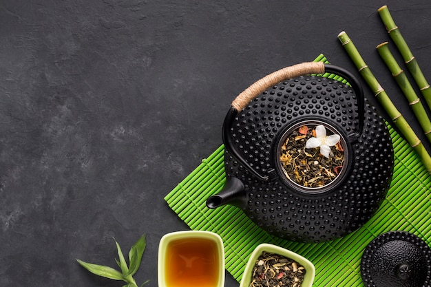 Free photo bowl of tea from various herb with dried flowers