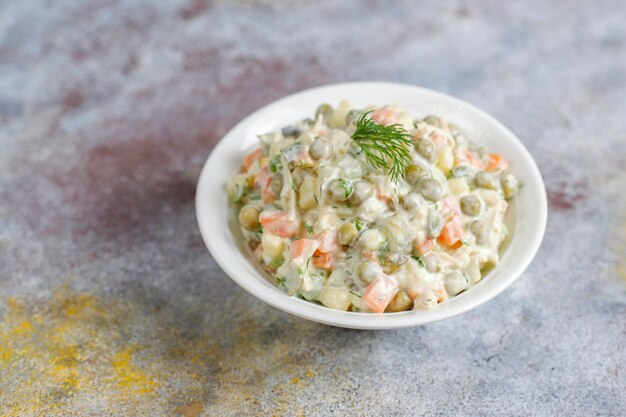 Bowl of traditional russian salad.