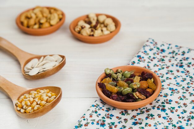 Bowl with beans on floral cloth