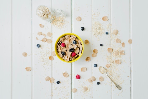 Bowl with corn flakes and berries