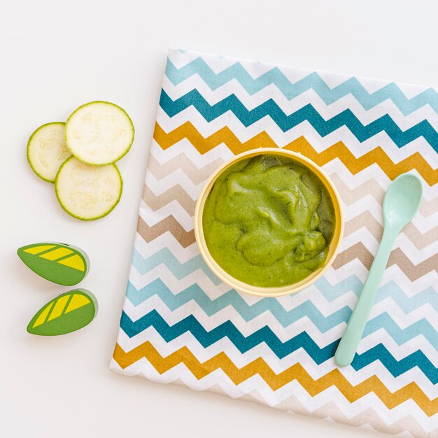 Bowl with cucumber puree for baby