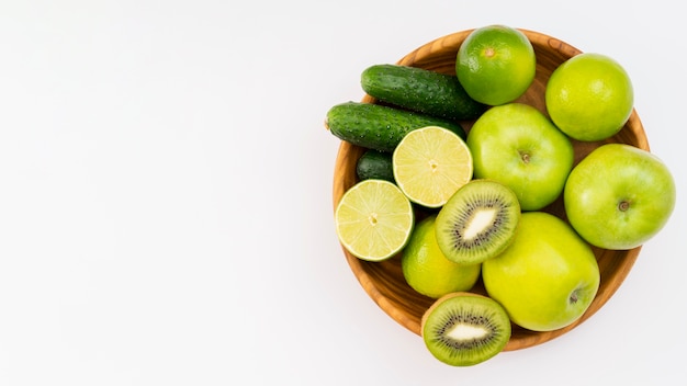 Bowl with delicious fruits