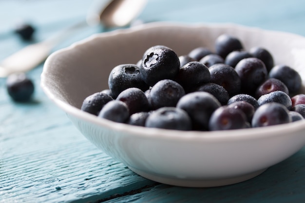 Bowl with fresh blueberries