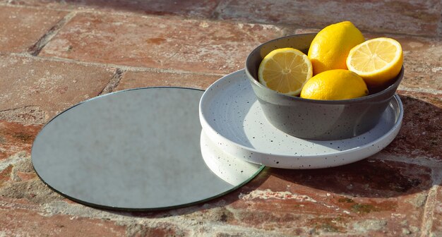 Bowl with fresh lemons