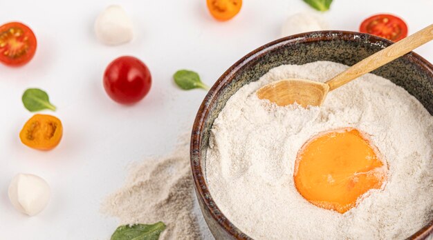 Bowl with pizza dough