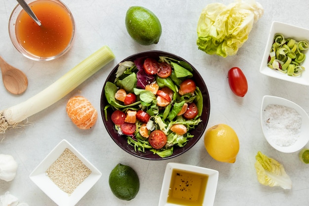 Bowl with salad and souces