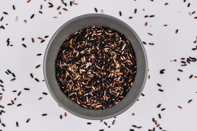 Bowl with uncooked black rice