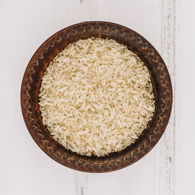 Bowl with uncooked rice