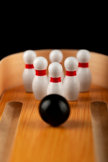 Free photo bowling pins and ball arrangement