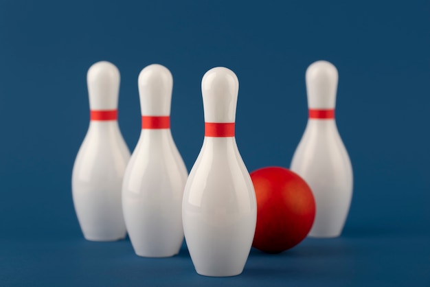 Free photo bowling pins and ball arrangement