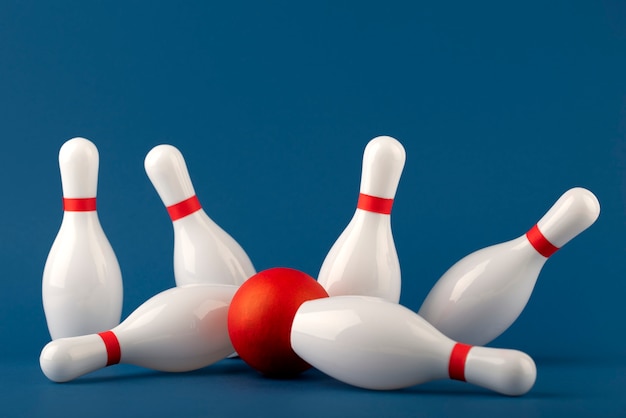 Free photo bowling pins and ball arrangement