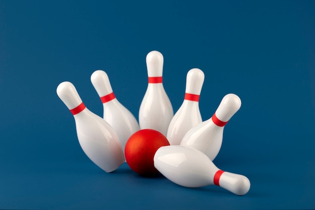 Free photo bowling pins and ball arrangement