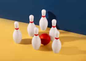 Free photo bowling pins and ball arrangement