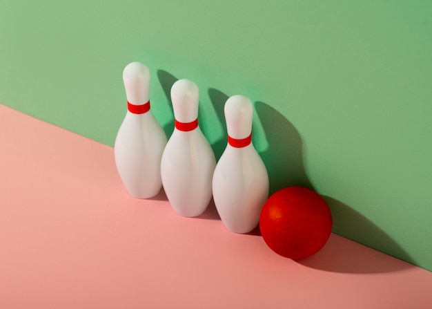 Free photo bowling pins and ball arrangement