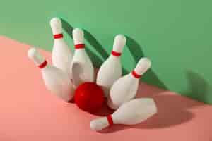 Free photo bowling pins and ball arrangement