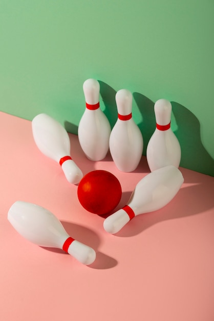 Free photo bowling pins and ball arrangement