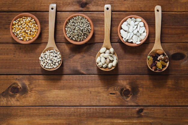 Bowls and ladles with seeds and nuts