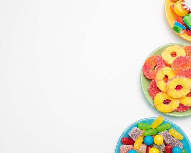 Bowls with jelly fruits and sweetmeats