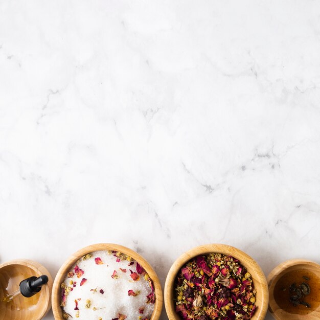 Bowls with natural skincare products with copy space