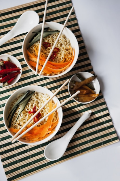 Free photo bowls with noodles