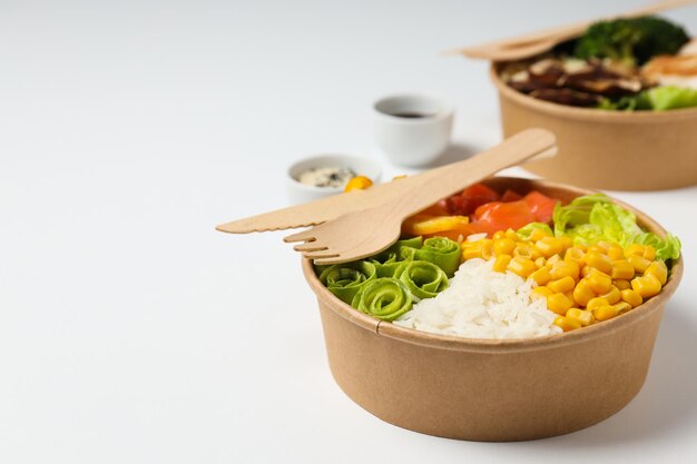 Bowls with tasty and nutritious food space for text