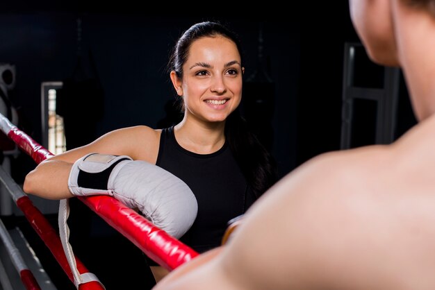 Boxer girl posing at the gym