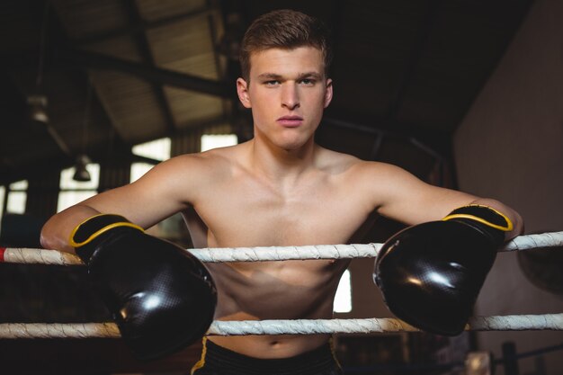 Boxer standing in boxing ring