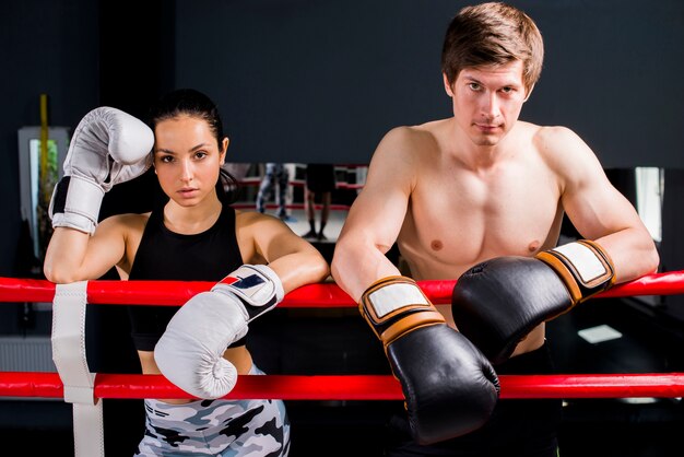 Boxers posing at the gym