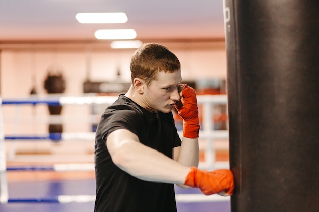 Free photo boxers train in the ring and in the gym